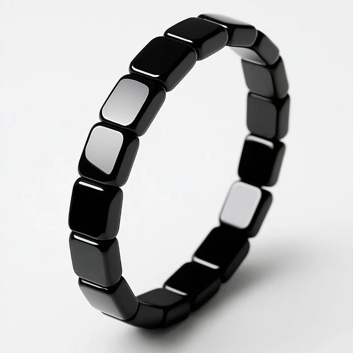 Black polished HEMATIX hematite bracelet on a white background