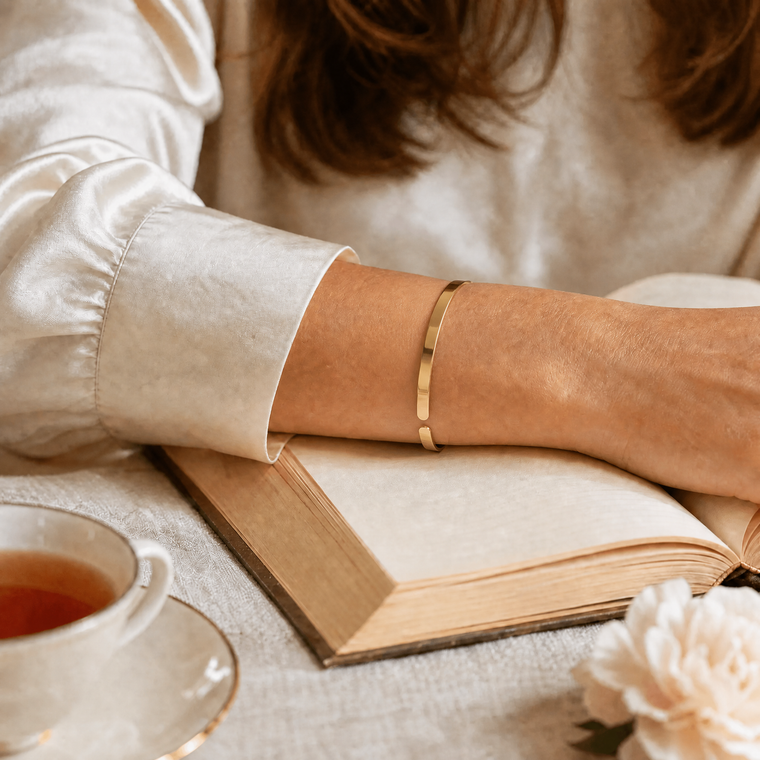 Wrist resting on an open book